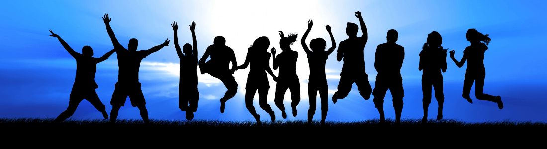Silhouette of group of people jumping excitedly