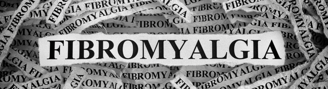 Fibromyalgia word cut out of newspaper